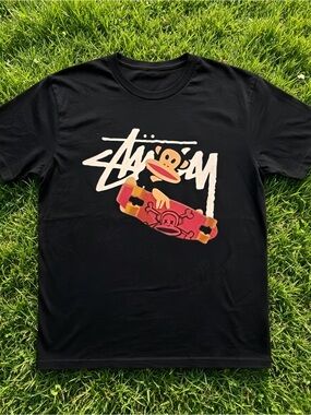 Stussy Julius skateboard pattern black unisex T-shirt.
